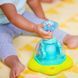 Музыкальная игрушка волчка Press & Glow Spinner Bright Starts 10042