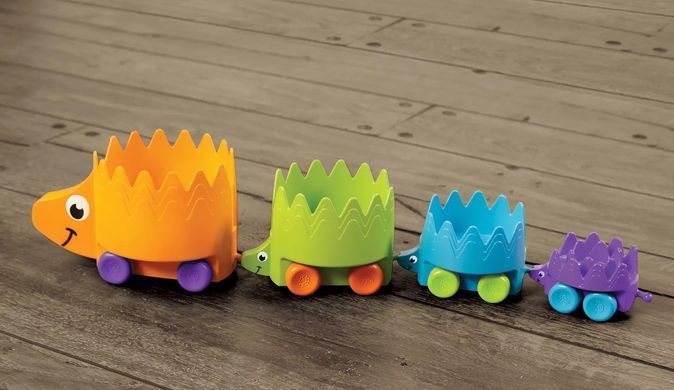 Пірамідка-каталка на колесах Їжачки Fat Brain Toys Hiding Hedgehogs F223ML