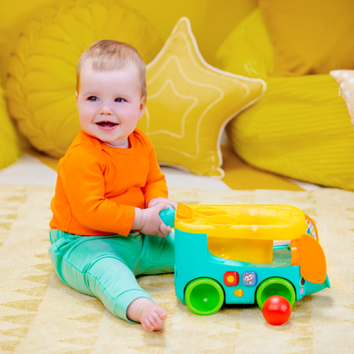 Музична іграшка Слон з м'ячиком Bright Starts Pop and Roll Safari Bus Kids II 16827
