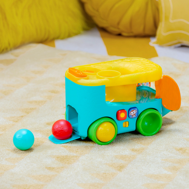 Музична іграшка Слон з м'ячиком Bright Starts Pop and Roll Safari Bus Kids II 16827