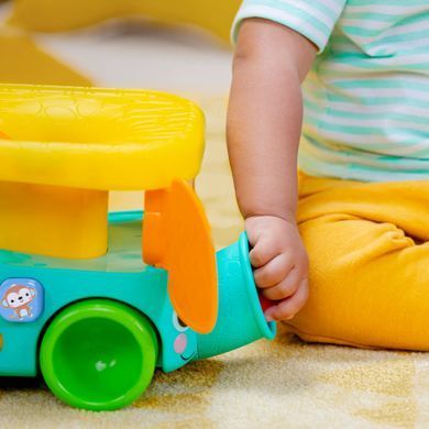 Музична іграшка Слон з м'ячиком Bright Starts Pop and Roll Safari Bus Kids II 16827
